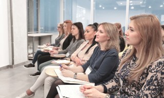 group of business people at a seminar in the modern office