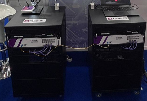 Two QKD nodes, connected by Li-Fi for transmission of the classic QKD channel and fiber optics for the quantum QKD channel